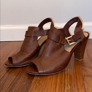 Brown heels with gold buckles